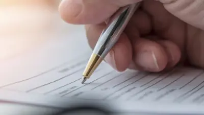 Person filling out form